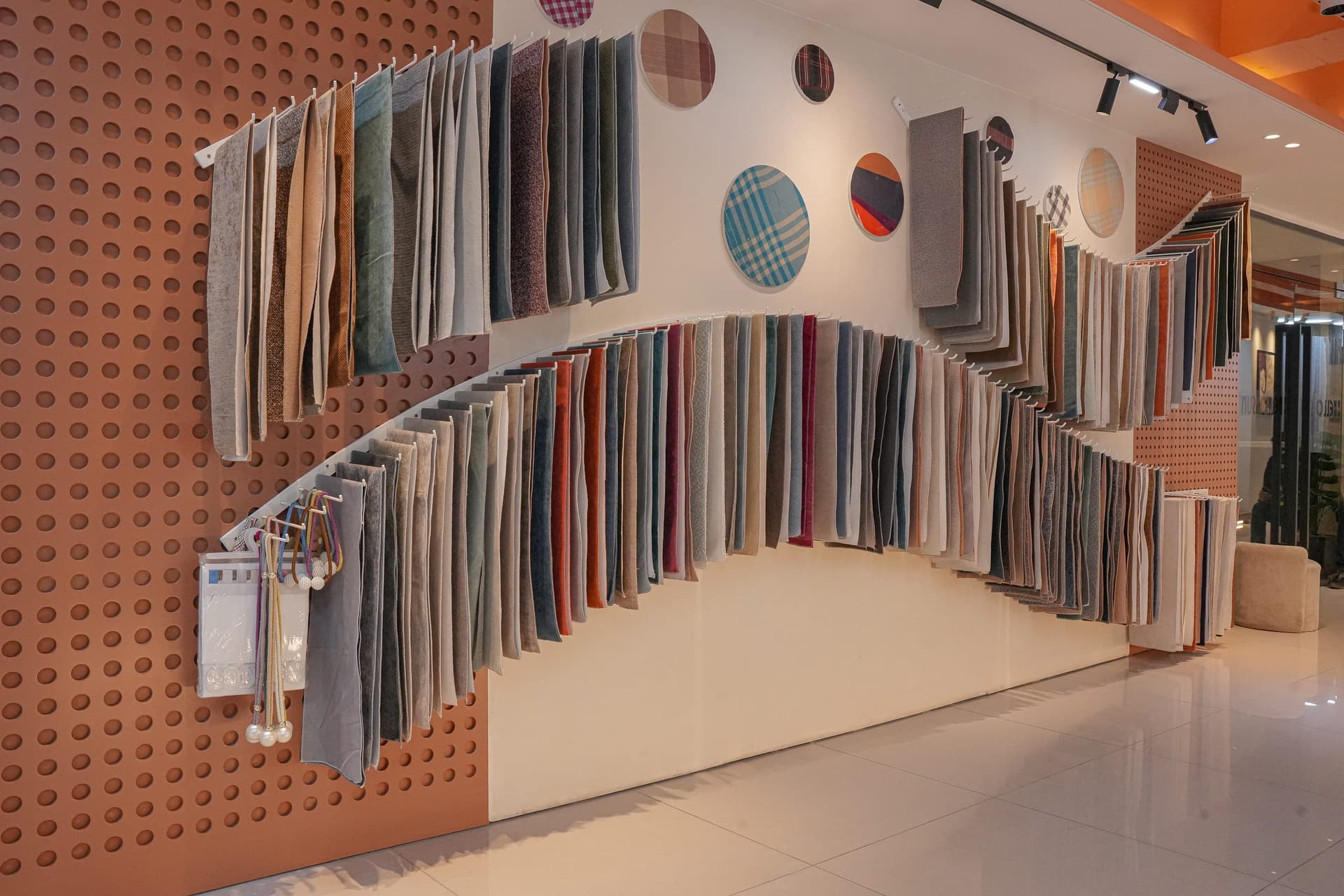 Full-drop drapery fabrics showcasing tonal neutral palette