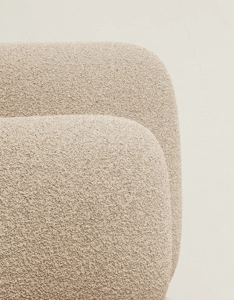 Close-up of bouclé upholstery fabric with a looped texture