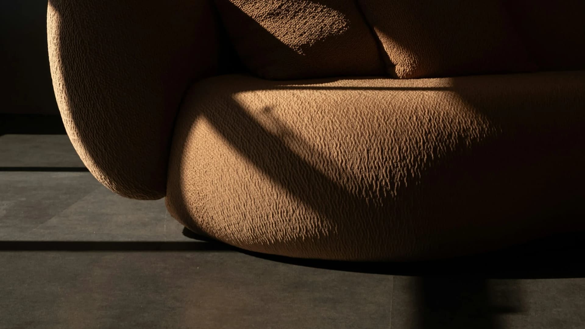 Contemporary sofa upholstered in textured neutral fabric